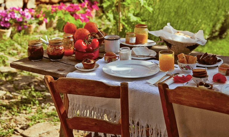 Cottagecore Outdoor Dining Table with Fringed Tablecloth