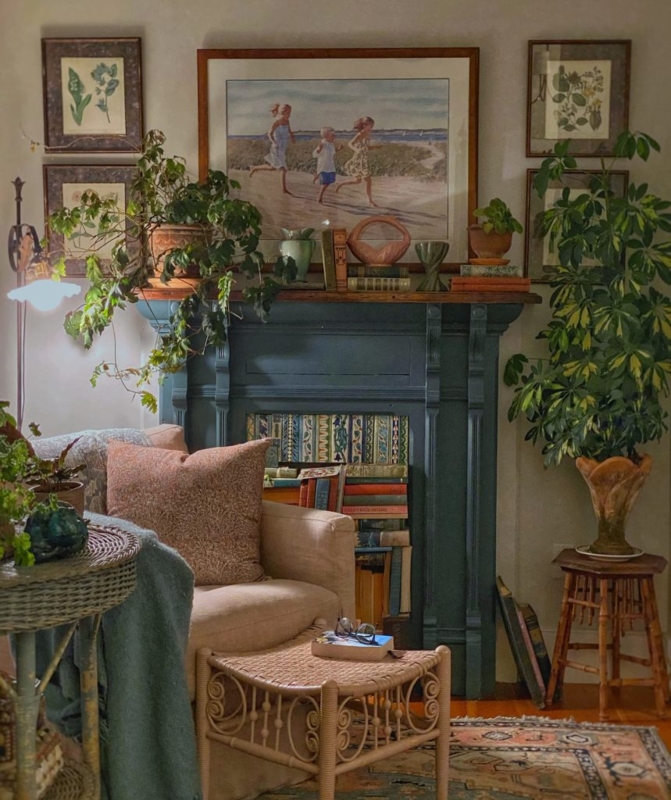 Cottagecore Reading Nook: Book-Filled Fireplace & Rattan Ottoman.