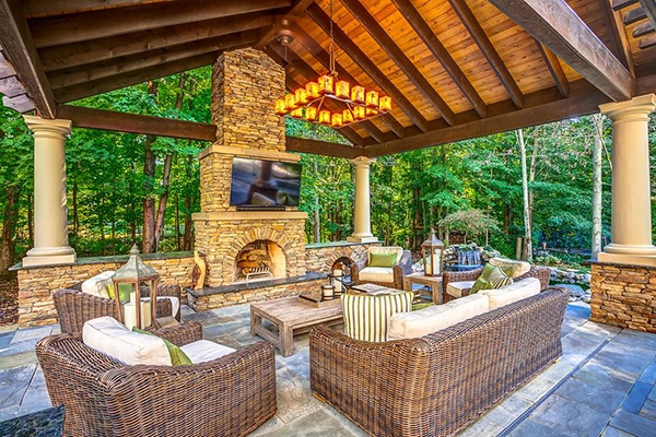 Covered Patio Lounge featuring Timber Vaulted Ceiling and Woven Wicker