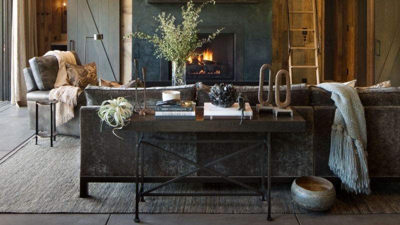 Cozy Fireplace Living Room Layout: Dark Textured Sofa & Console Table.