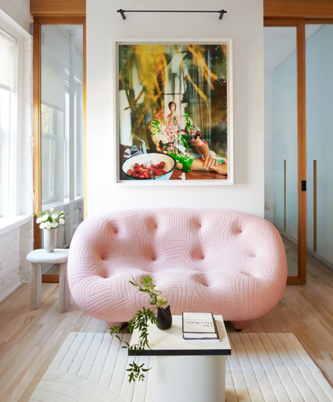 Curved Pink Sofa with Deep Button Tufting Details