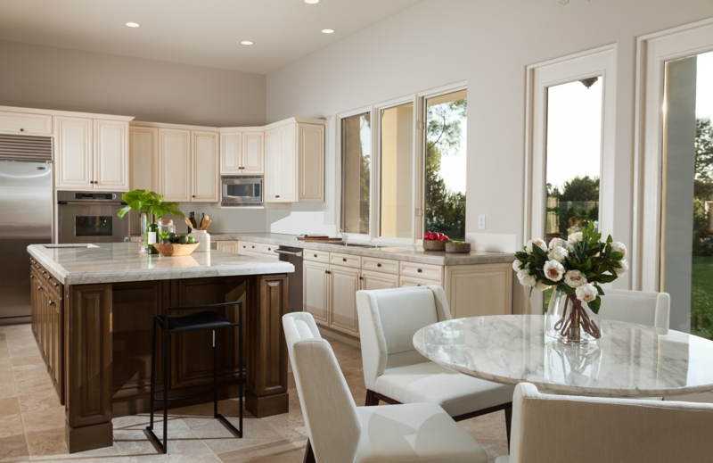 Dark Wood Island Kitchen: Cream Cabinetry & Stone Counters Layout
