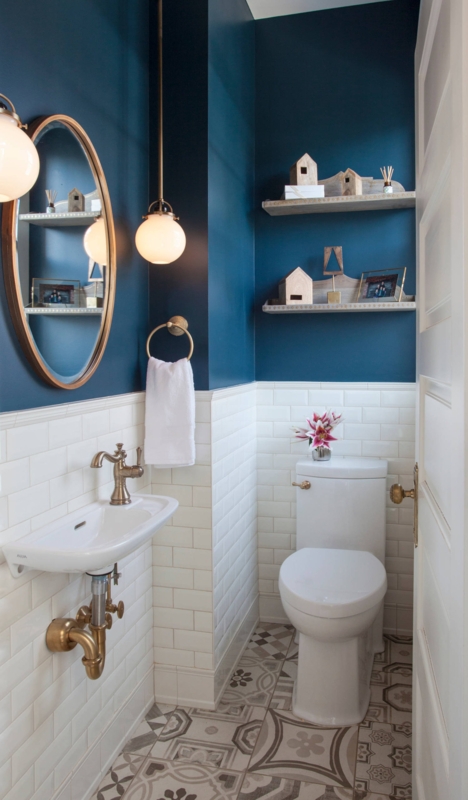 Deep Teal Powder Room with Brass Exposed Plumbing and Geometric Floor Tile