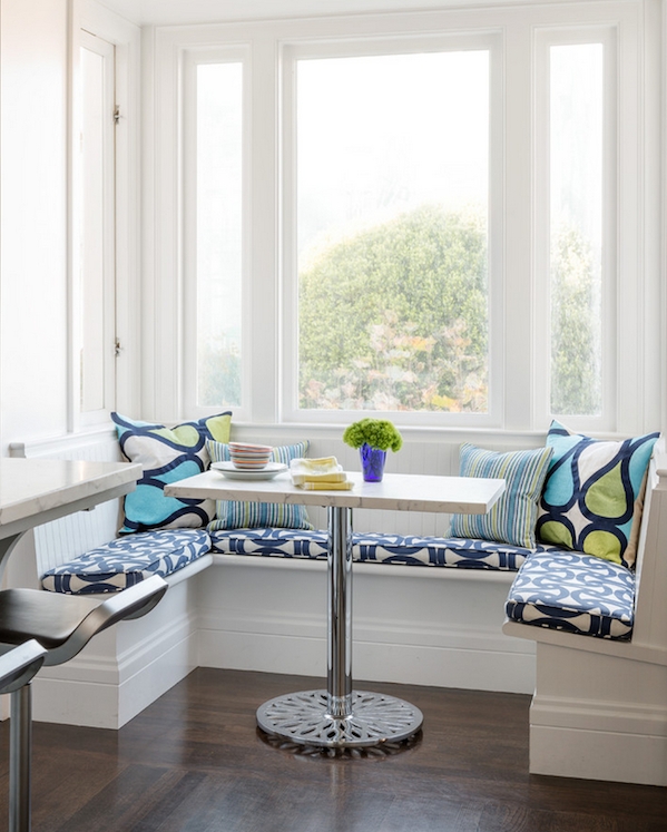 Dining Nook featuring Marble Pedestal Table and Geometric Cushions