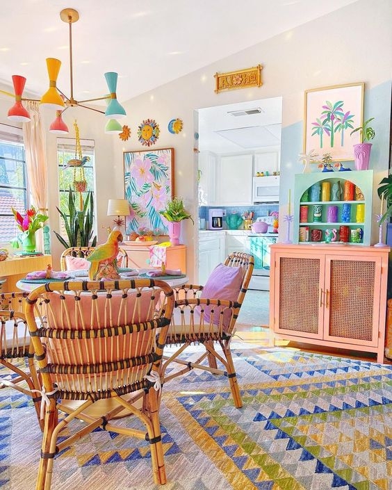 Dopamine Decor Dining Room with Rattan Chairs and Geometric Rug