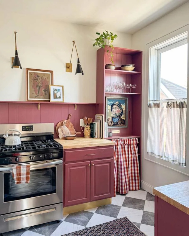 Dusty Rose Kitchen Cabinets with Checkerboard Floor and Open Shelving