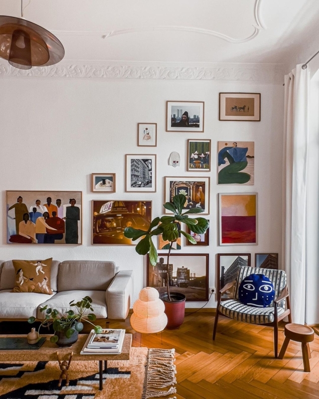 Eclectic Gallery Wall Design with Herringbone Floors