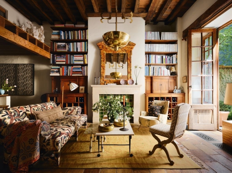 Eclectic Living Room Library with Green Tile Fireplace