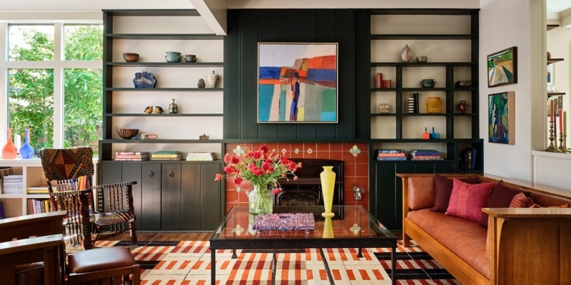 Eclectic Living Room with Dark Green Built-ins and Terracotta Tiles
