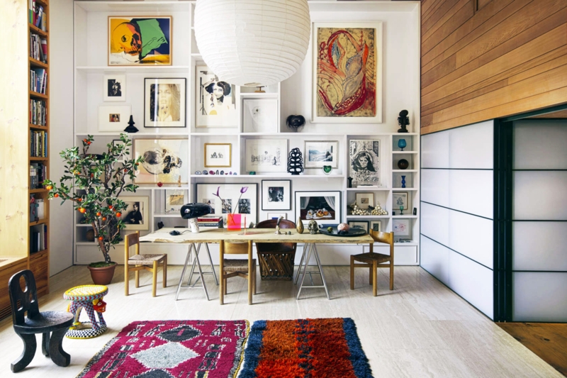 Eclectic Loft Dining Room: Floor-to-Ceiling Shelving & Live-Edge Table