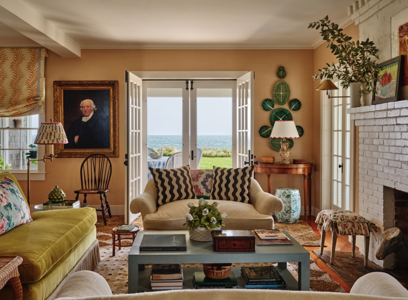 Eclectic Traditional Living Room Design with Peach Walls and Sea View