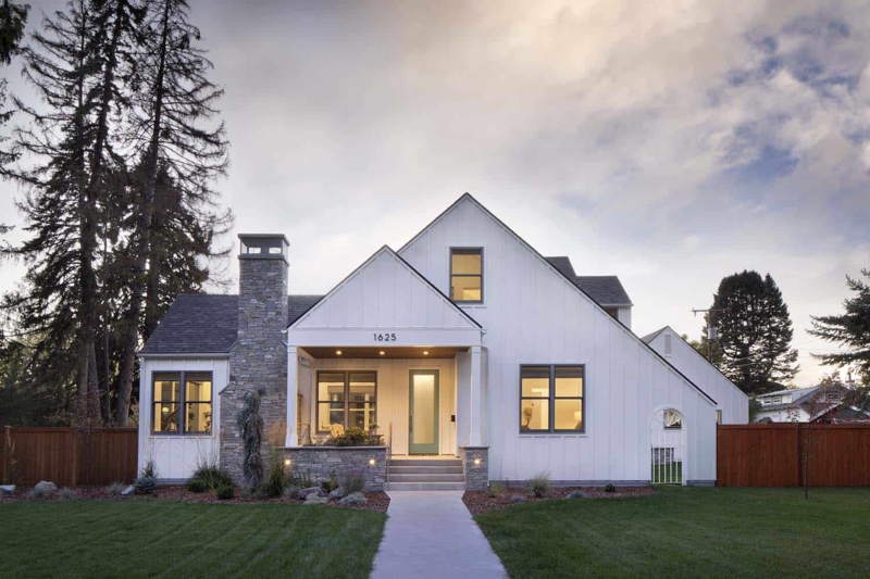 Farmhouse Exterior with White Board and Batten & Stone Chimney