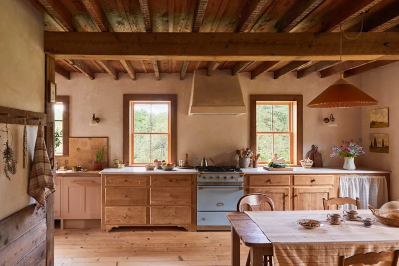 Farmhouse Kitchen Styling with Pale Blue Range and Exposed Beams