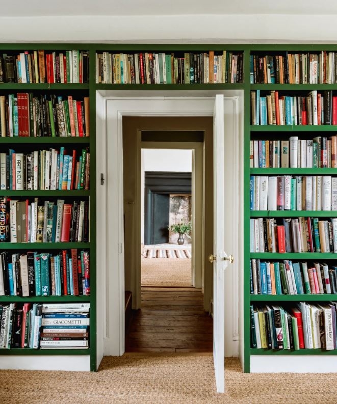 Forest Green Built-In Bookcase Framing Doorway with Jute Rug