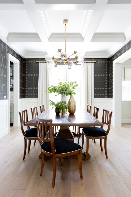 Formal Dining Room with grid pattern wallpaper and coffered ceiling.