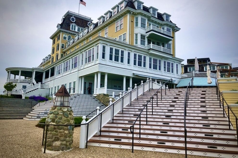 Grand Coastal Hotel Tiered Outdoor Staircase Mansard Roof