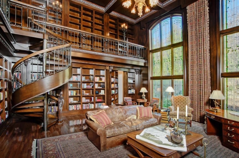 Grand Home Library: Two Story Layout with Massive Arched Windows