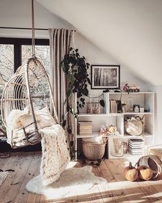 Hanging Egg Chair in a Sloped Ceiling Attic Reading Nook