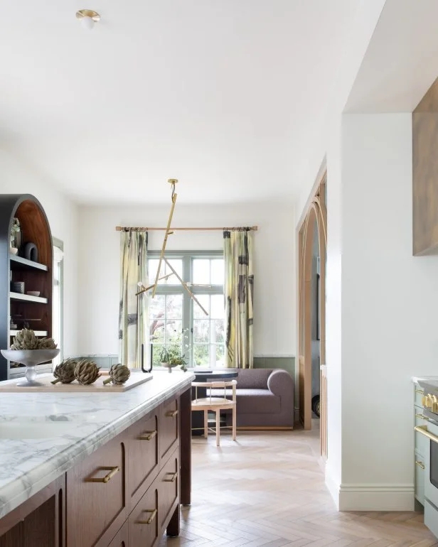 Herringbone Wood Floor Kitchen: Branch Lighting & Arched Shelving
