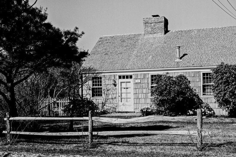 Historic Beach Cottage Architecture with Split Rail Fence