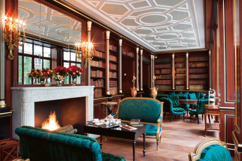 Hotel Library Lounge with Teal Upholstery and Geometric Ceiling