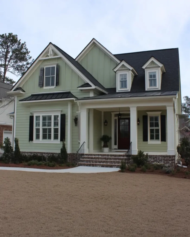 House Exterior with Black Trim and Deep Red Front Door