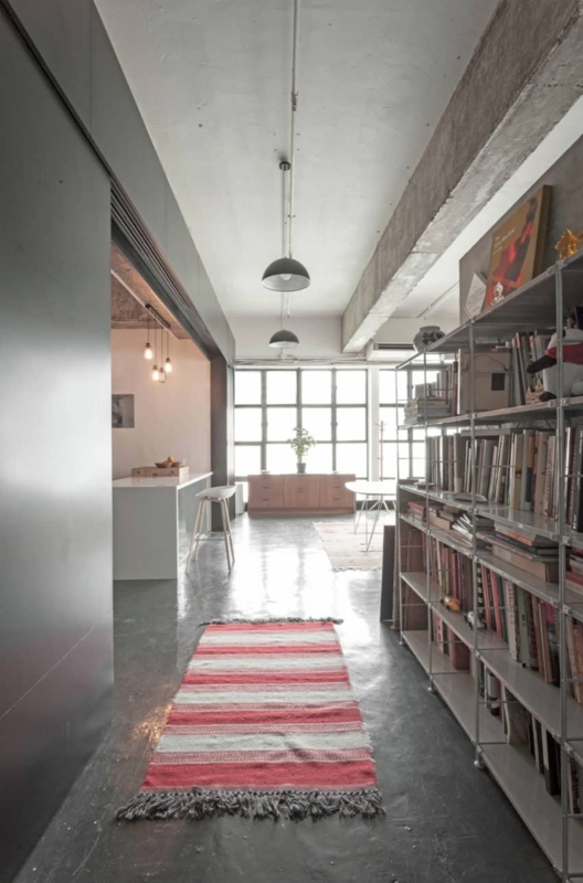 Industrial Loft Hallway: Polished Concrete Floor & Red Striped Runner