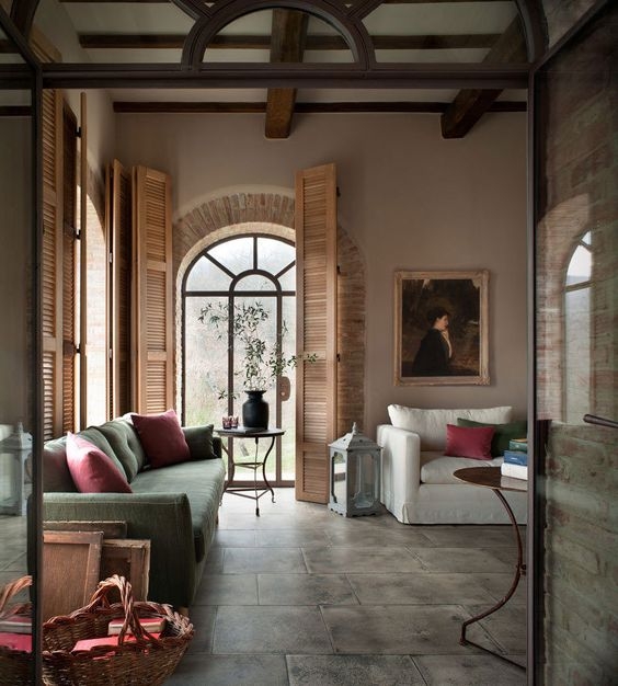 Italian Villa Living Room with Arched Window & Louvered Shutters