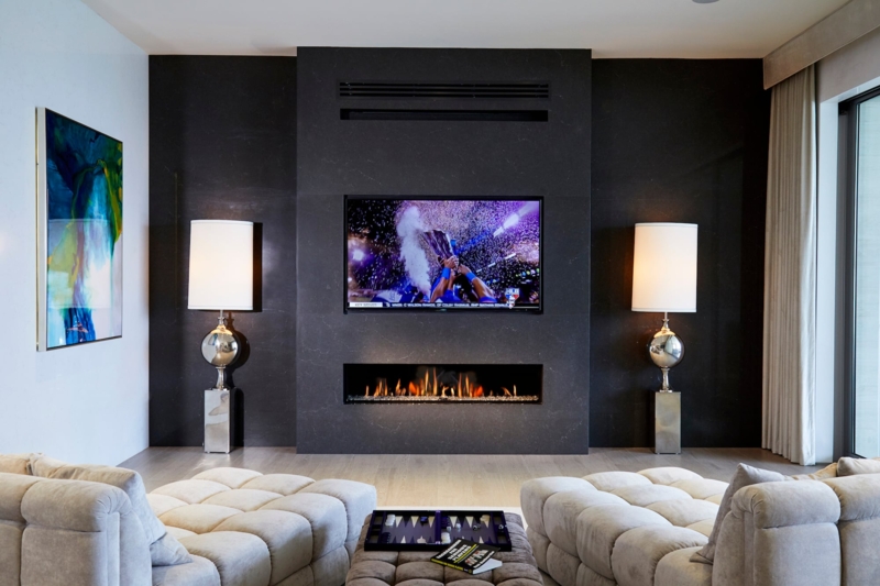 Linear Fireplace Dark Stone Media Wall Symmetrical Design