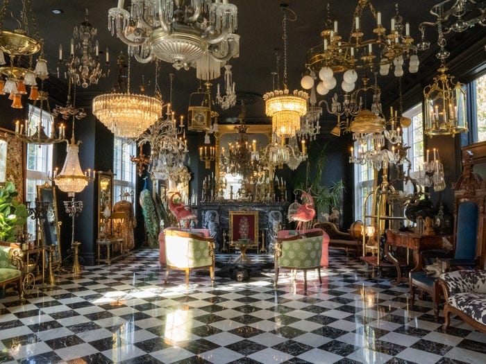 Living Room: Black Walls with Checkered Floor, Chandelier Collection