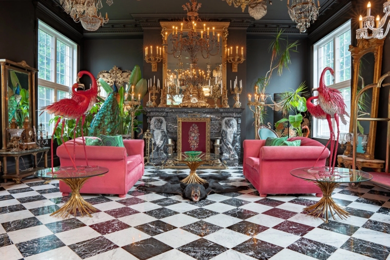 Living Room: Checkered Floor, Flamingo Statues, Pink Armchairs