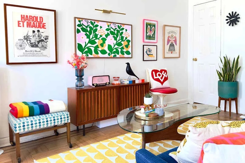 Living Room featuring Scalloped Yellow Rug and Mid-Century Gallery Wall