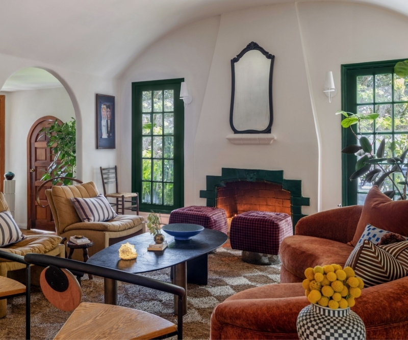 Living Room with Forest Green Window Trim and Vaulted Ceiling