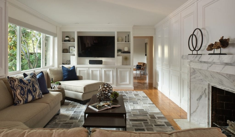 Living Room with Full Wall Paneling & Integrated Media Built-Ins