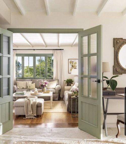 Living Room with Skirted Sofa and Sage Green Trim