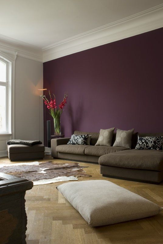 Low Profile Sectional Sofa Layout and Deep Plum Accent Wall