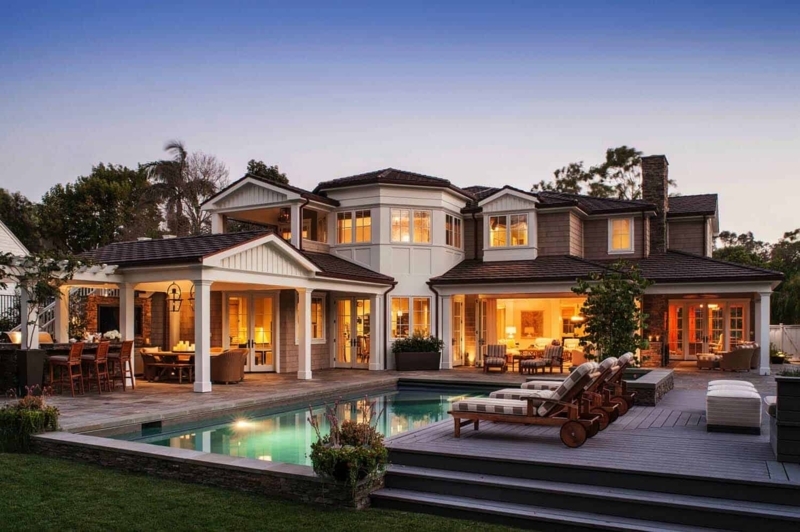 Luxury Backyard Pool Design: Multi-Level Patio & Shingle Siding