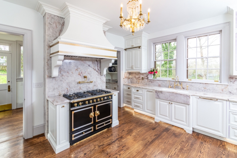 Luxury Kitchen with Black and Gold Range & Fluted Farmhouse Sink