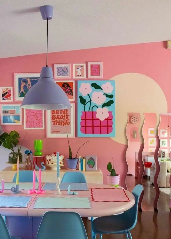 Maximalist Dining Room with Pink Walls and Wavy Edged Mirrors
