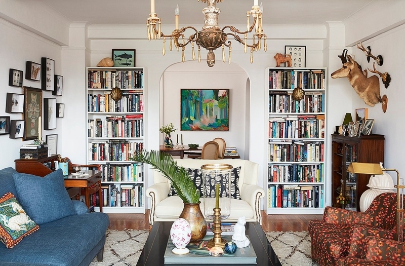 Maximalist Living Room: Archway Symmetry & Library Shelving Design