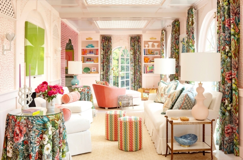 Maximalist Pink Living Room Ideas featuring Striped Pouf Accents