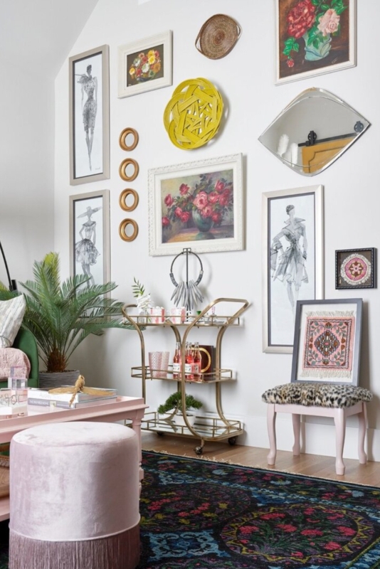 Maximalist Studio Apartment Decor Ideas with Fringed Pink Ottoman