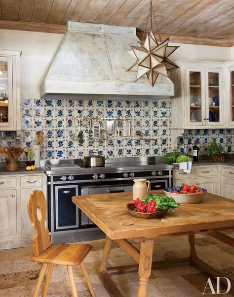 Mediterranean Kitchen Scene: Blue Tile Backsplash & Star Pendant Light