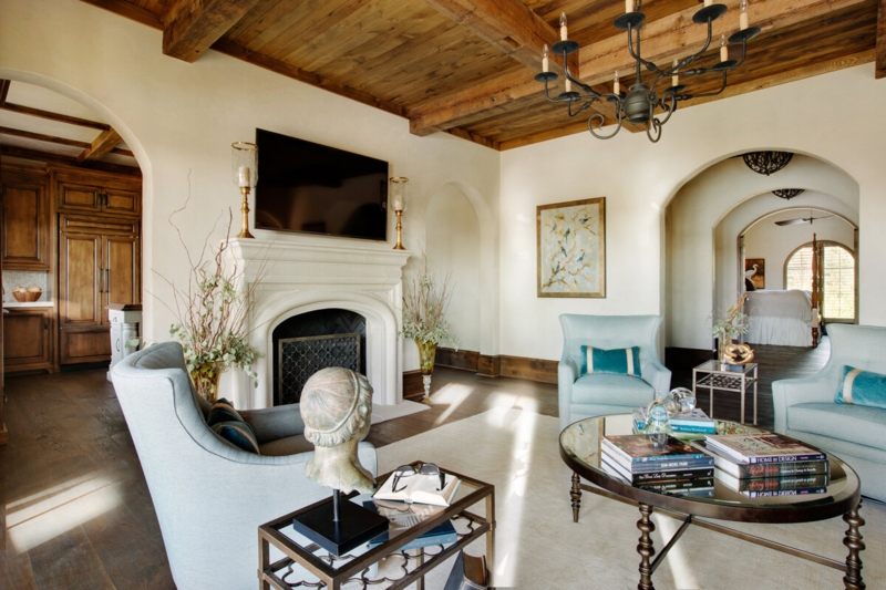 Mediterranean Living Room: Arched Doorways & Exposed Beams