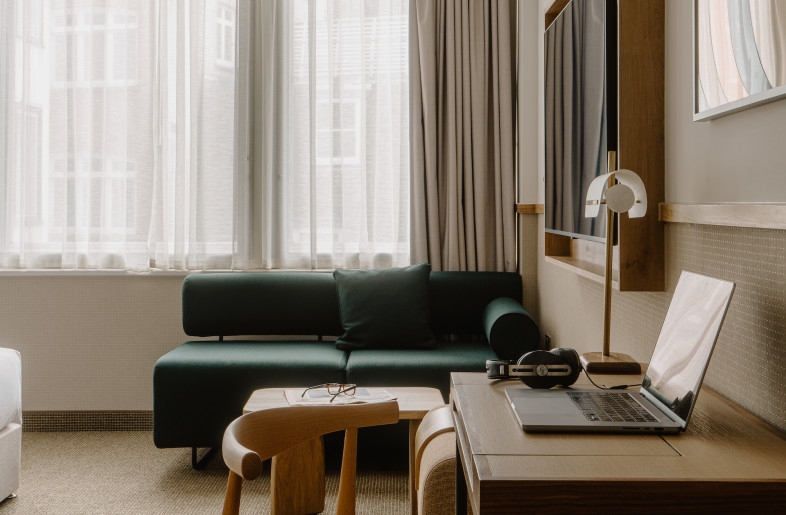 Mid-Century Hotel Room: Forest Green Sofa, Integrated Media Desk & Chair
