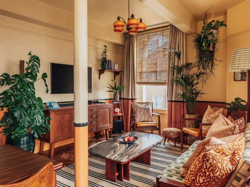 Mid-Century Living Room: Terracotta Lower Wall, Veined Stone Table