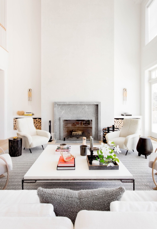 Minimalist Beach House Living Room with Towering Stone Fireplace