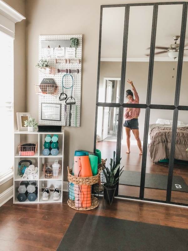Minimalist Bedroom Gym Nook With Grid Floor Mirror Storage