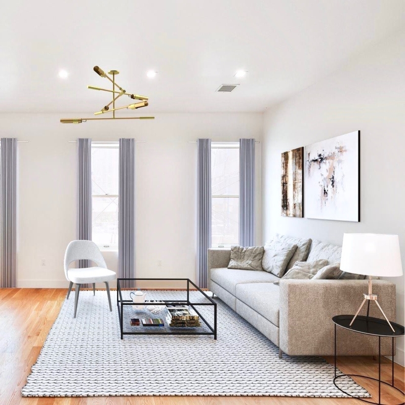 Minimalist Living Room Layout with Gray Sectional and Brass Chandelier