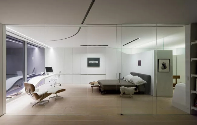 Minimalist Loft Bedroom Office Layout: Glass Partition & Curved Desk